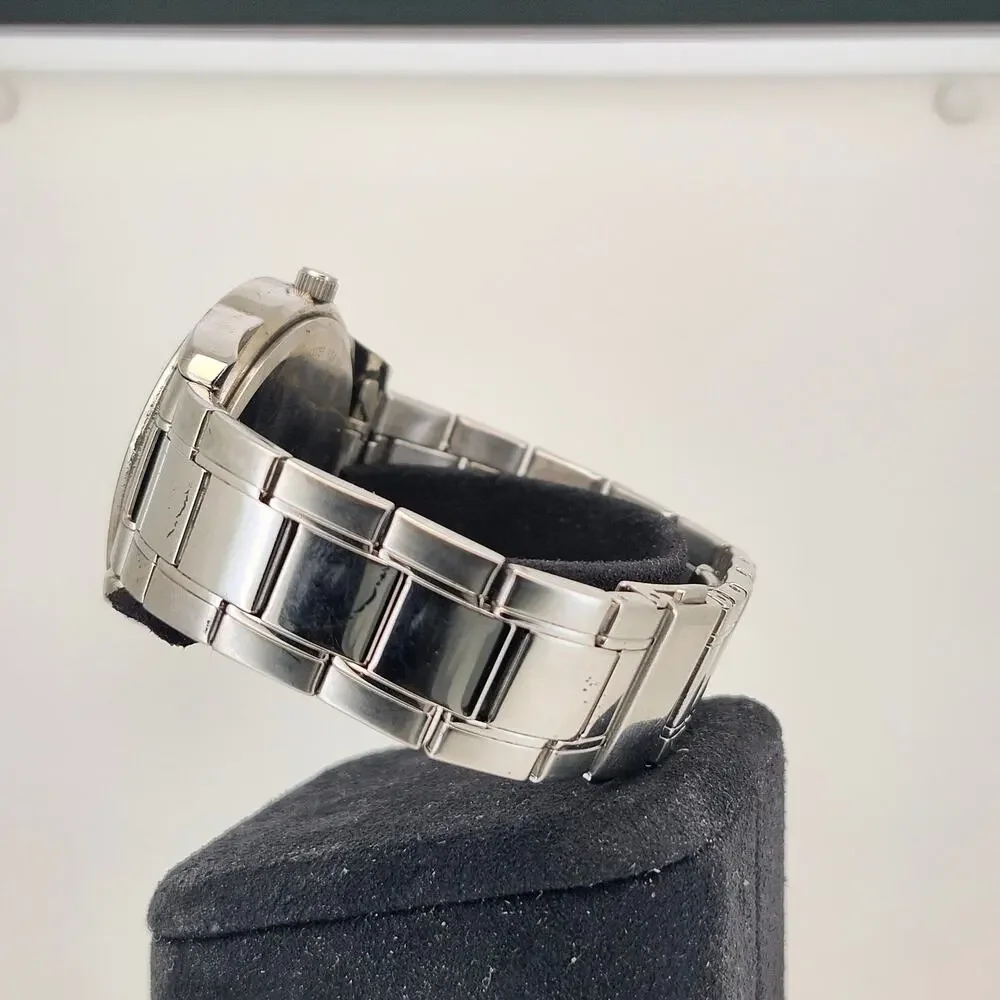 Caravelle by Bulova Men's Silver Tone Black Dial Quartz Watch